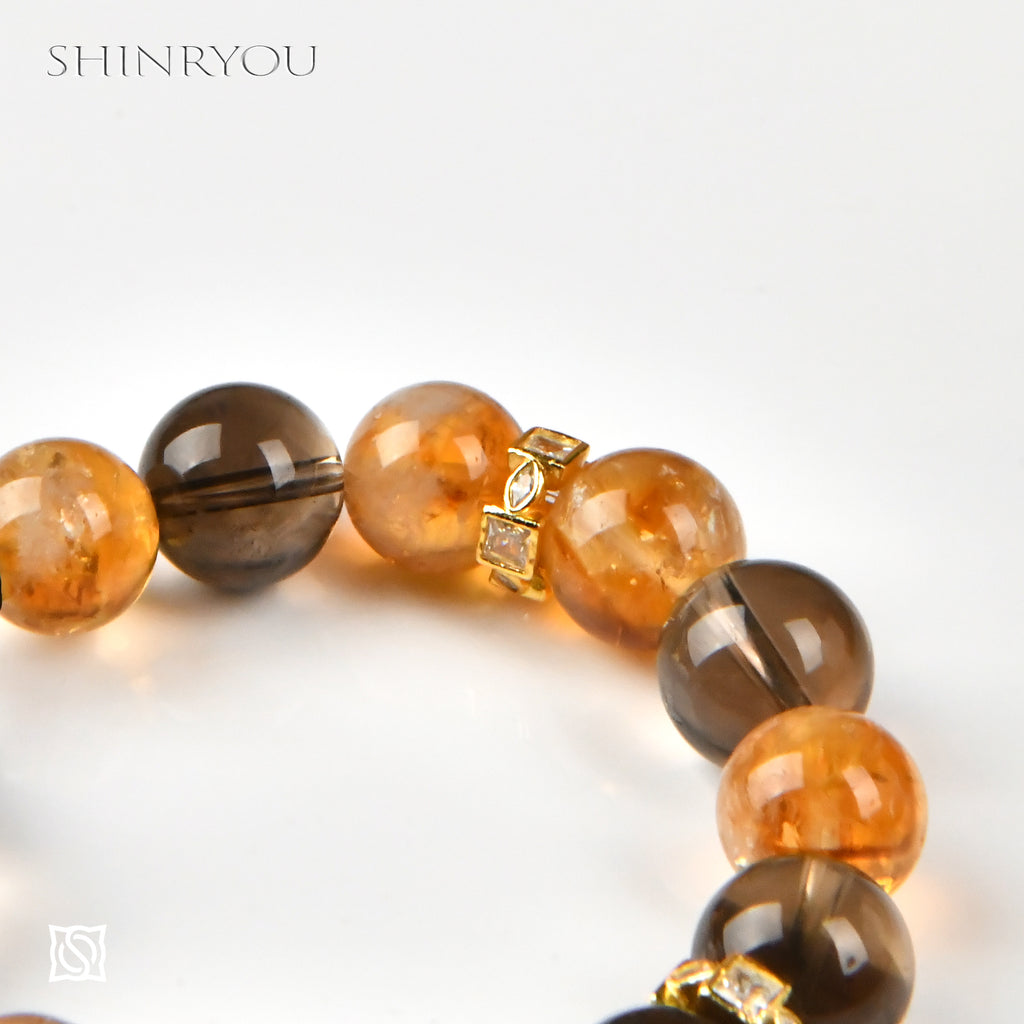 シトリンスモーキークオーツカットルチルブレスレット